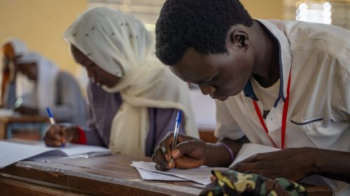 Refugee Students taking exams.